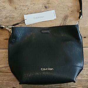 Black Calvin Klein leather purse